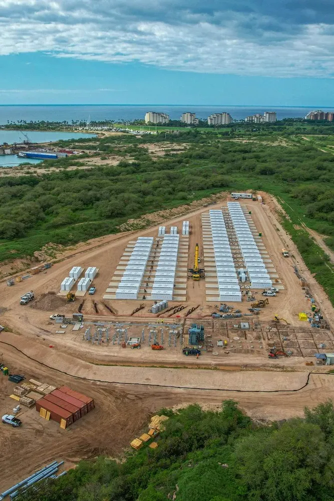 Construction site with rows of white structures