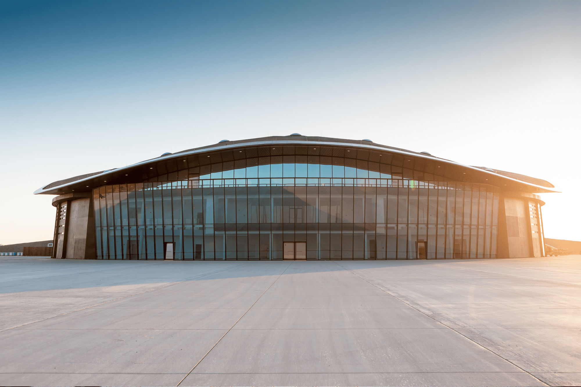 Large hangar building with glass facade